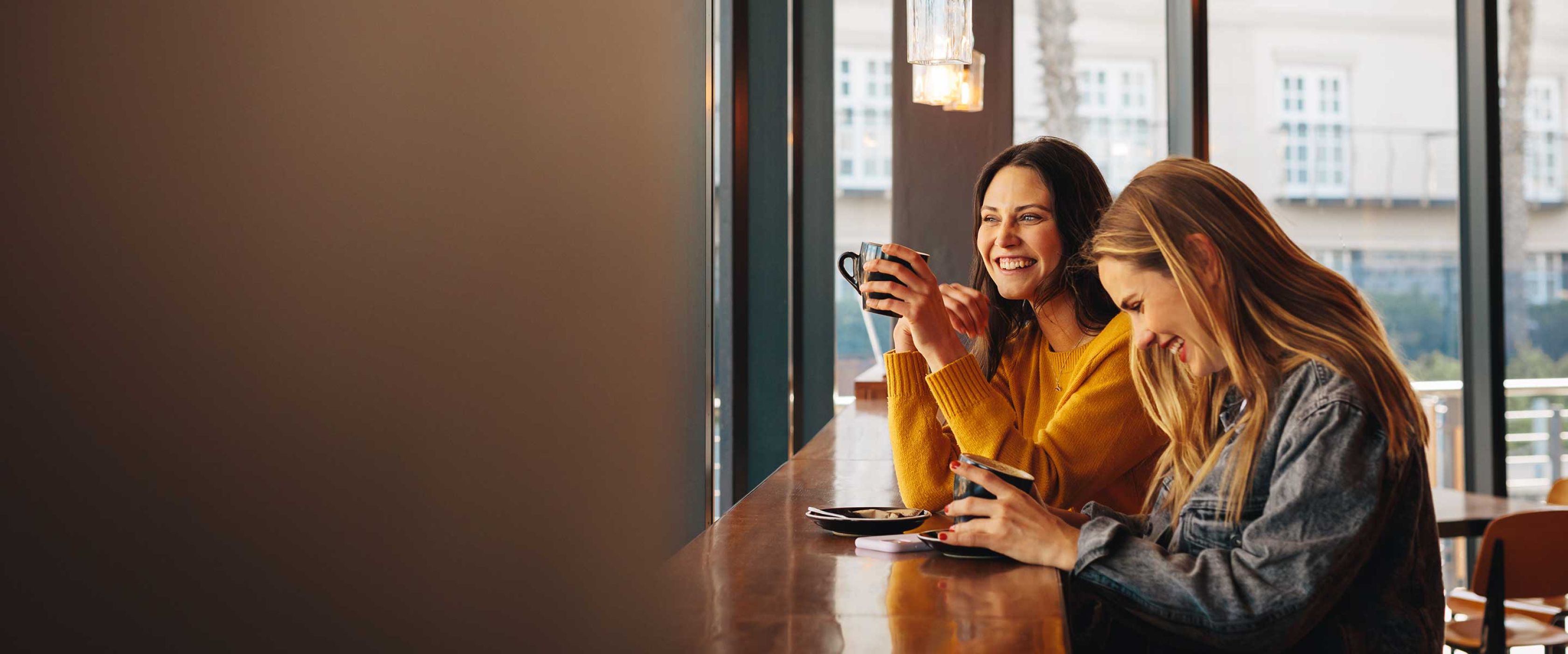 Two woman at a coffee shop