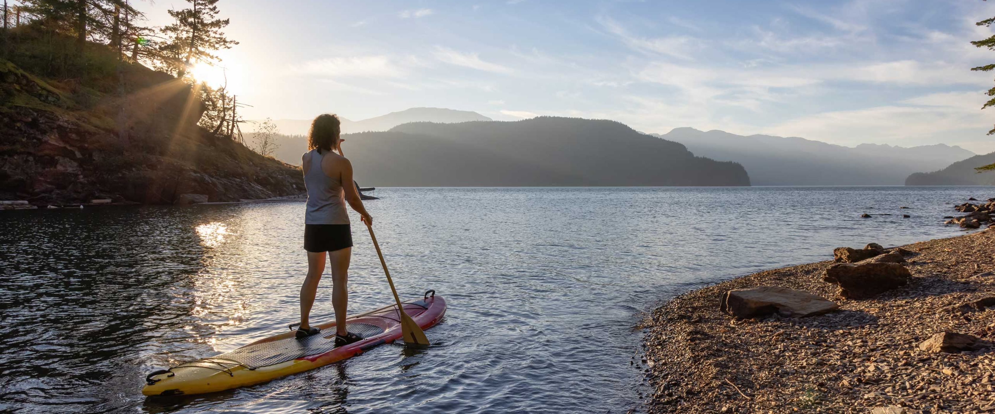 Woman paddle boarding