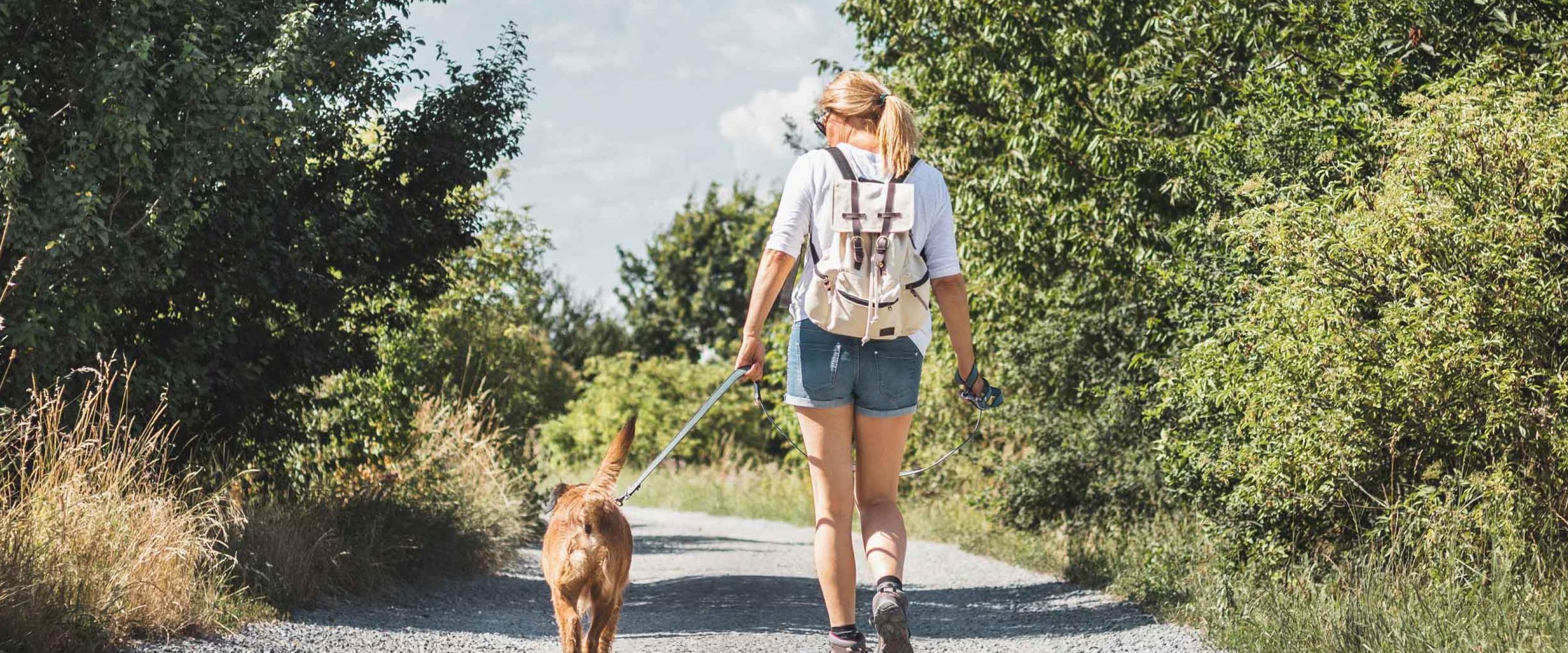 Woman walking her dog