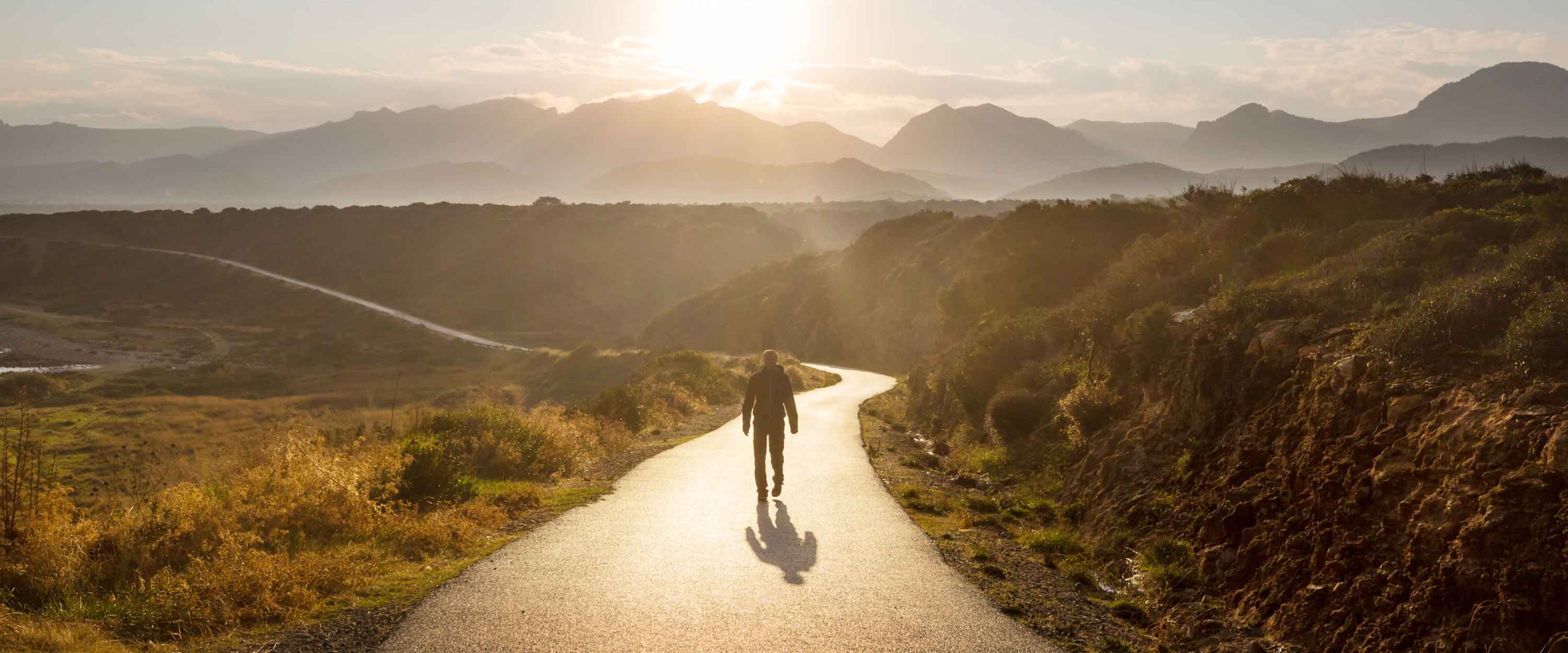 Person walking down a trail