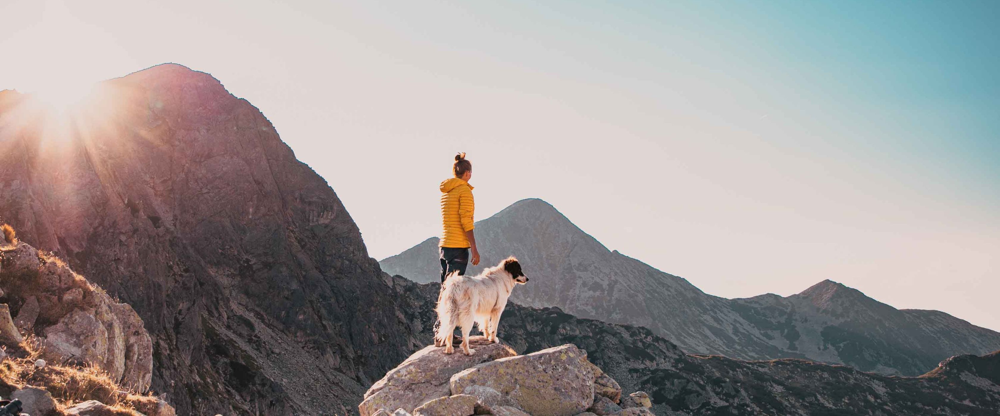 Woman and dog hiking