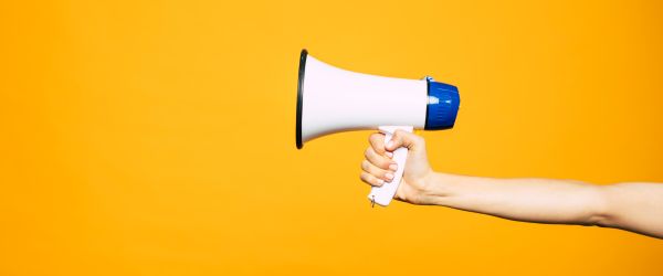 Megaphone on yellow background