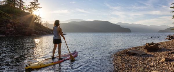 Woman paddle boarding