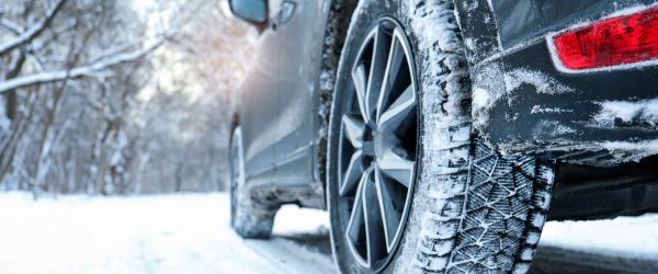 Car driving on snowy road