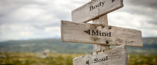 Sign post directing to self care