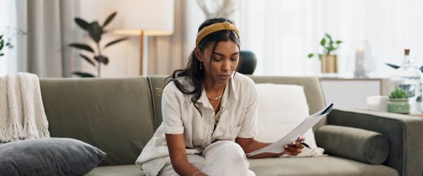 A clinician calculates her taxes