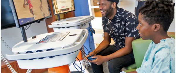 GO Karts child playing a game at the hospital