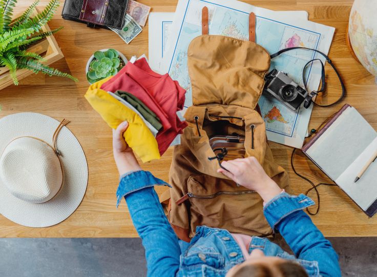 Woman packing her bag