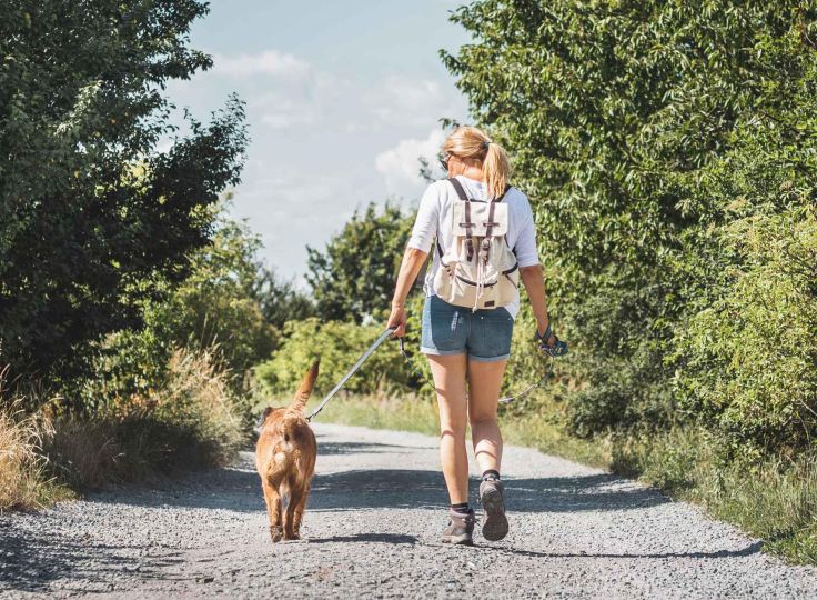 Woman walking her dog