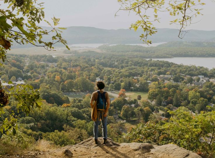 Person looking over hills