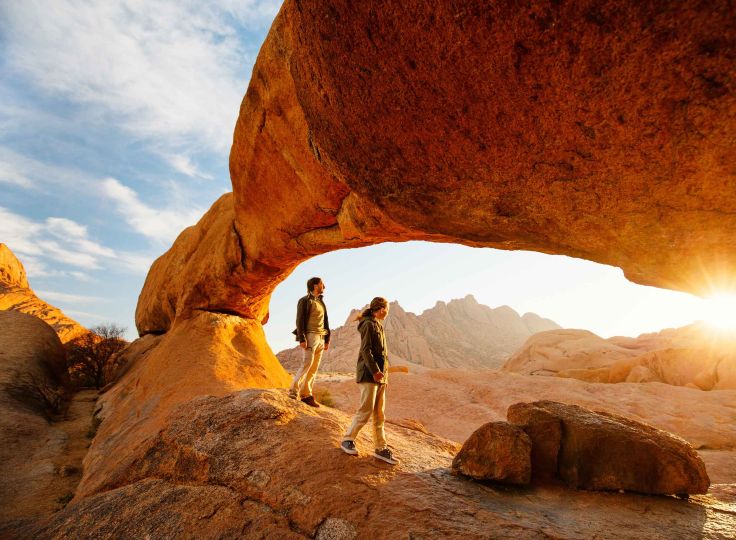 People standing at Grand Arches 