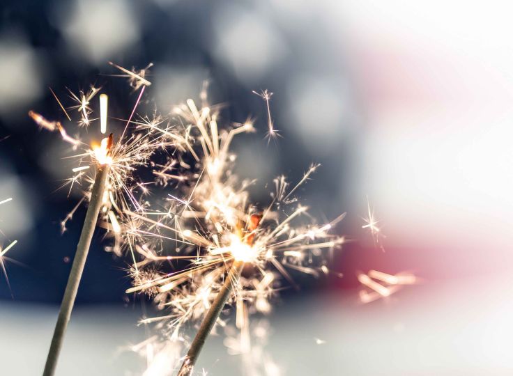 Sparkler in front of american flag