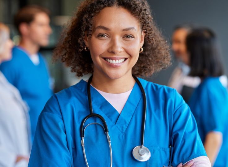 A clinician smiles