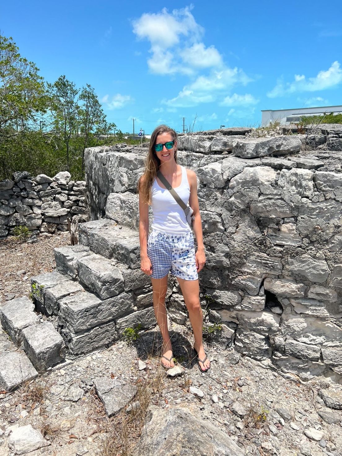 Woman Standing in front of rocks