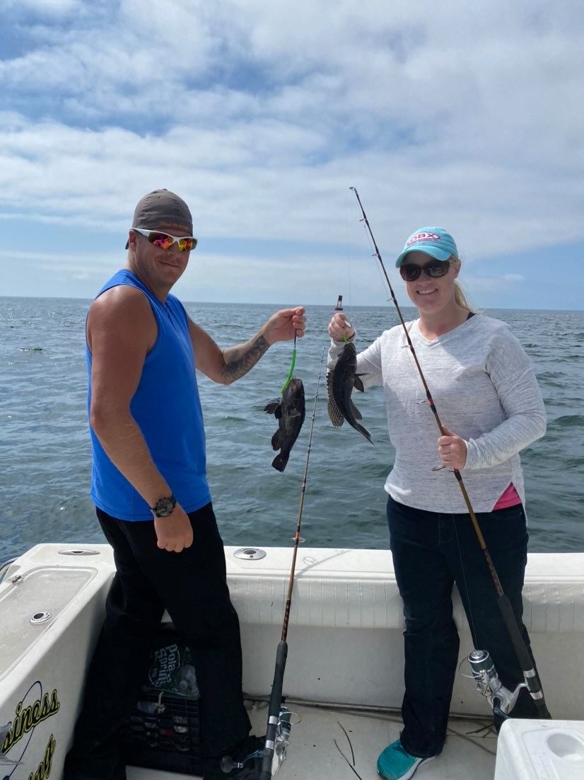 Man and woman with fishing poles