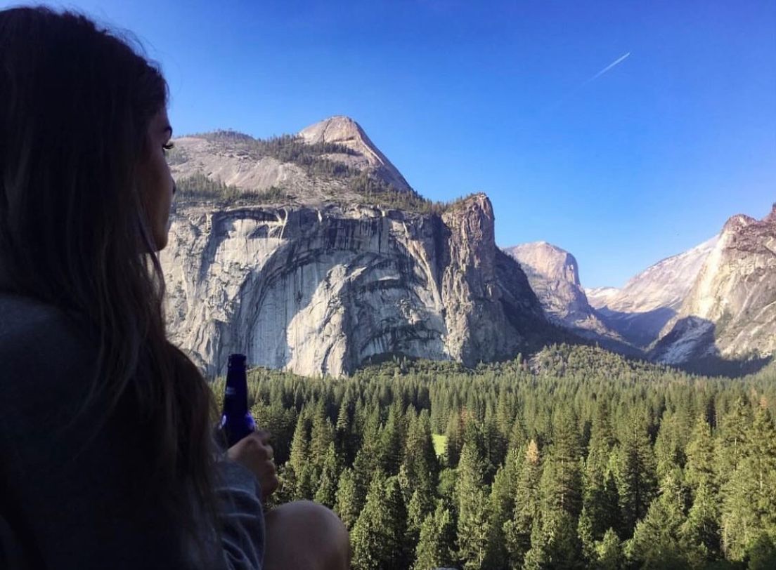 Woman looking at trees