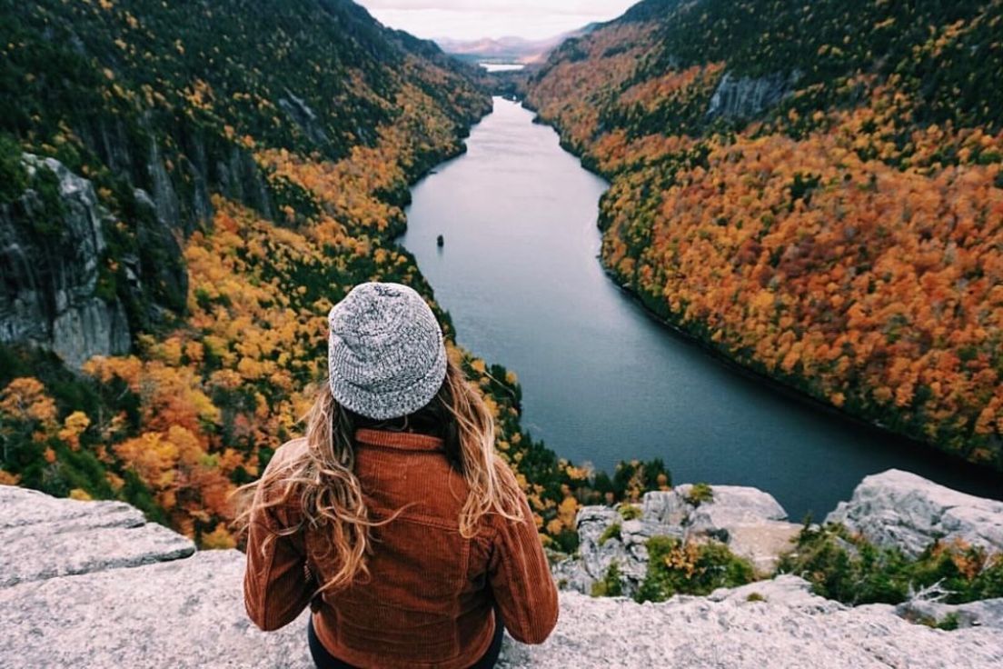 Woman looking at a river