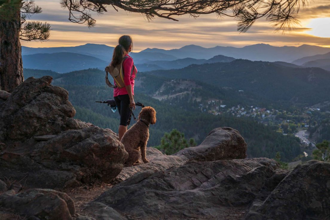 Woman and dog hiking in denver