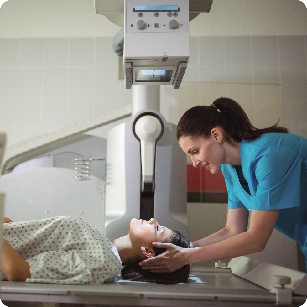 A Travel allied clinician readies a patient for a medical scan