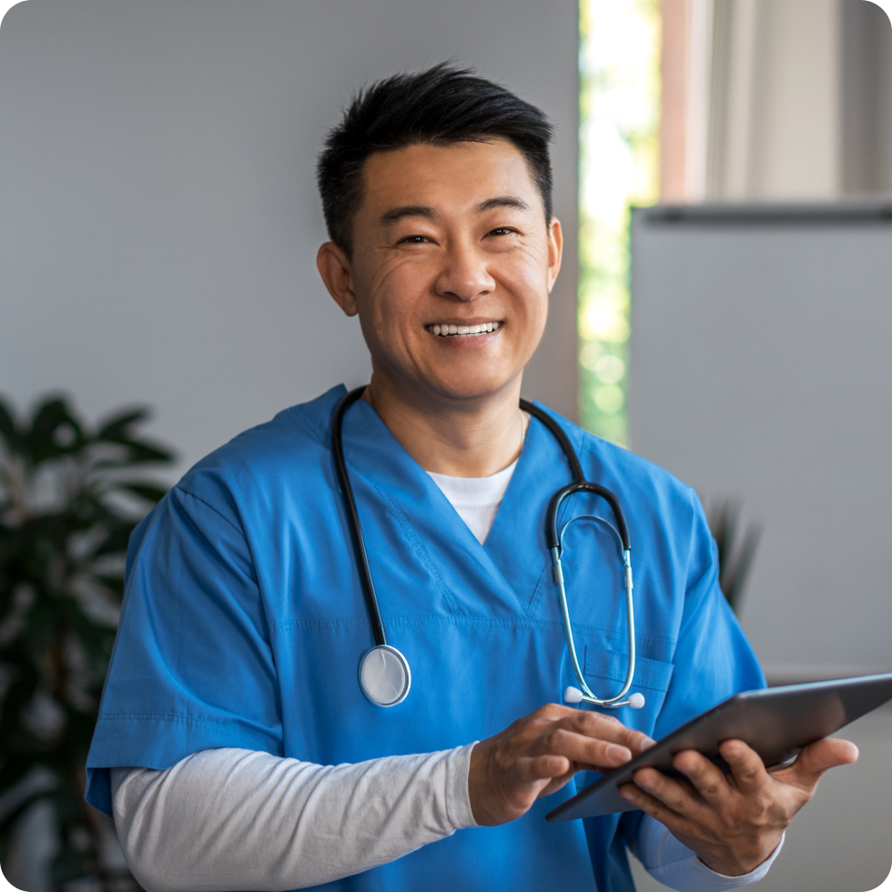 A smiling nurse reviews new assignment locations on the FlexCare App