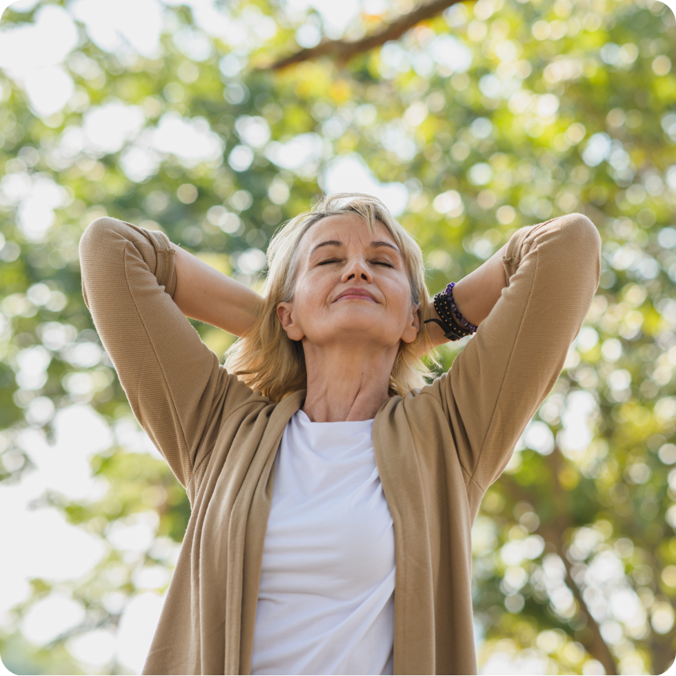 A travel therapist enjoys a moment of relaxing at the peaceful assignment location