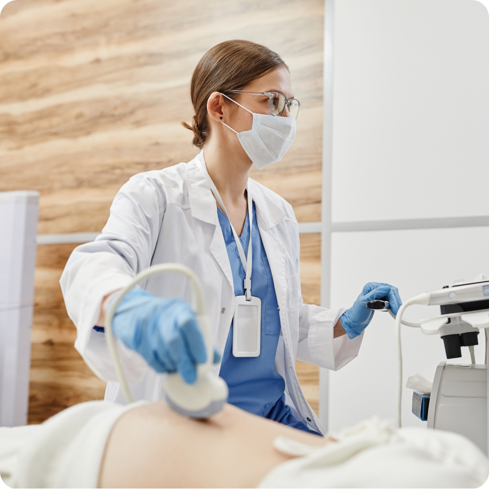 A travellng allied clinician performs an ultrasound
