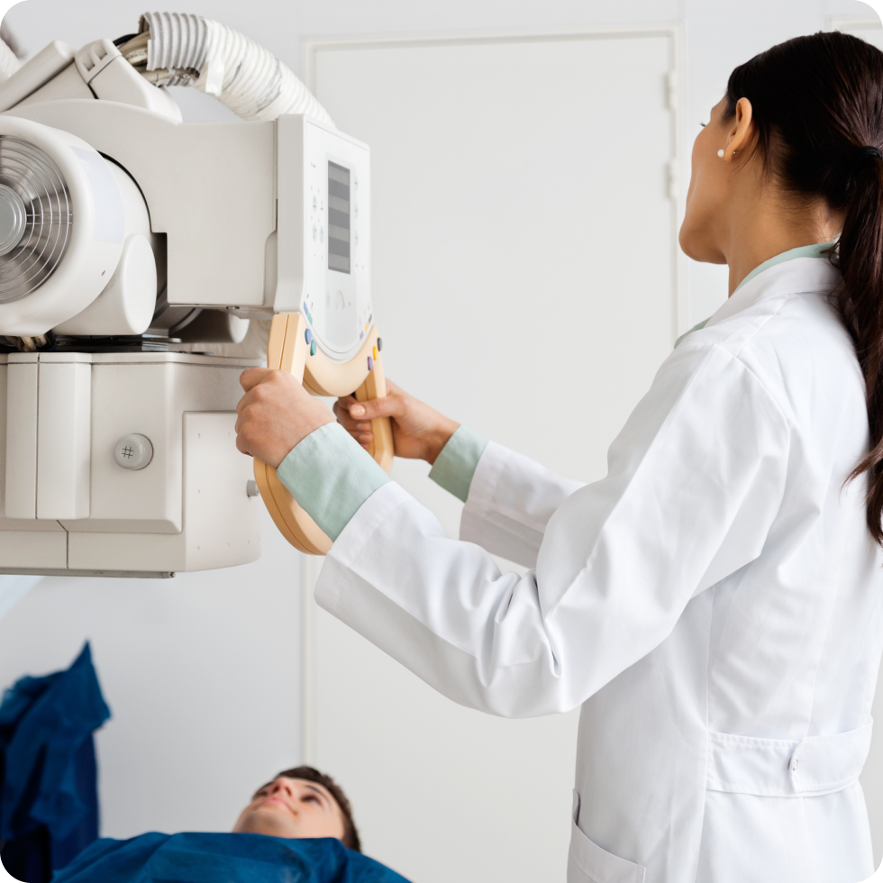 A travel allied clinician prepares a patient for medical imaging