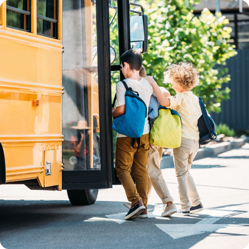 Children boarding a school bus