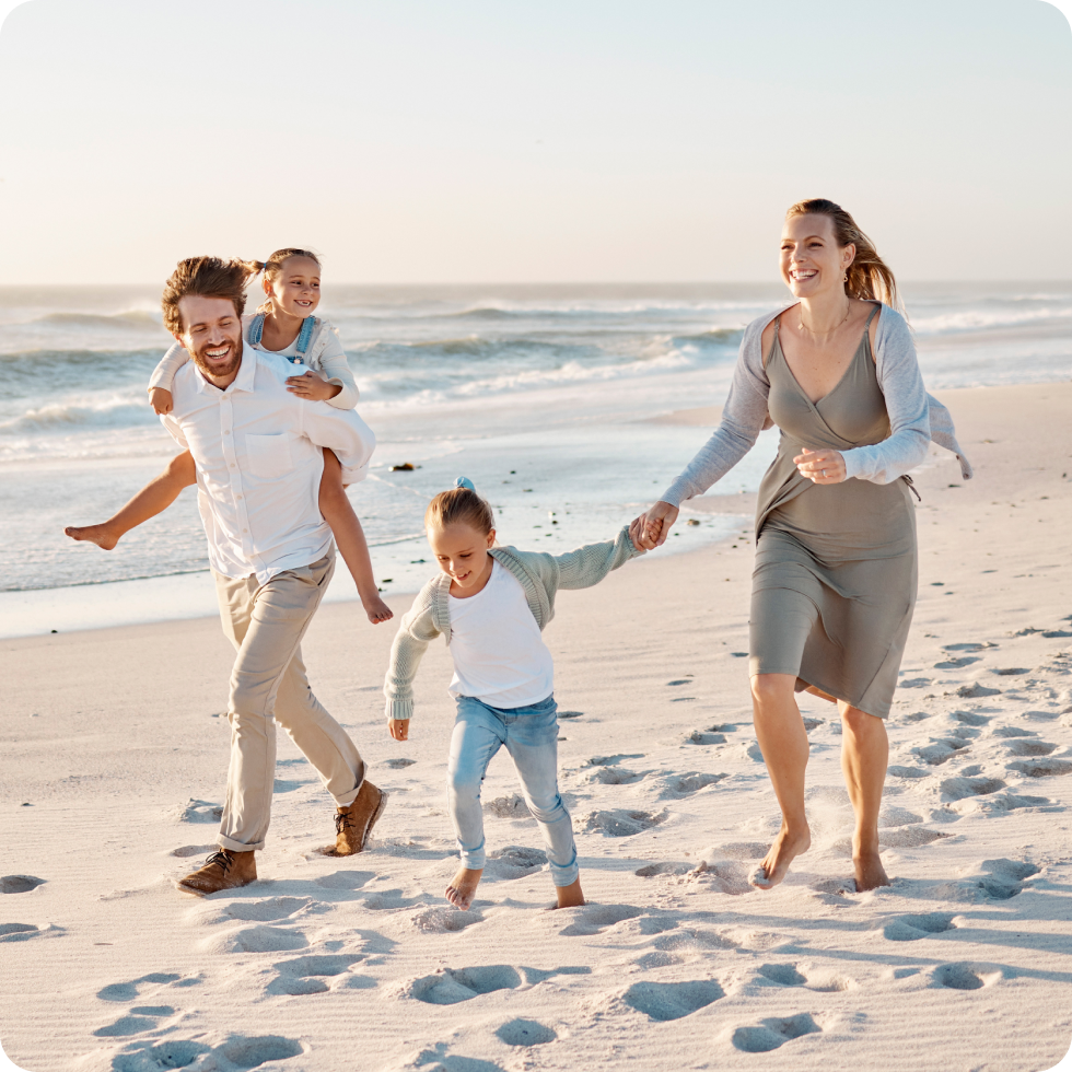 A family walking on the beach
