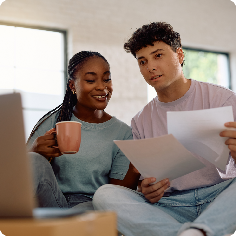 A clinician and their partner work on their budget