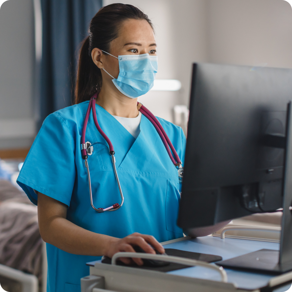 A clinician updates patient records