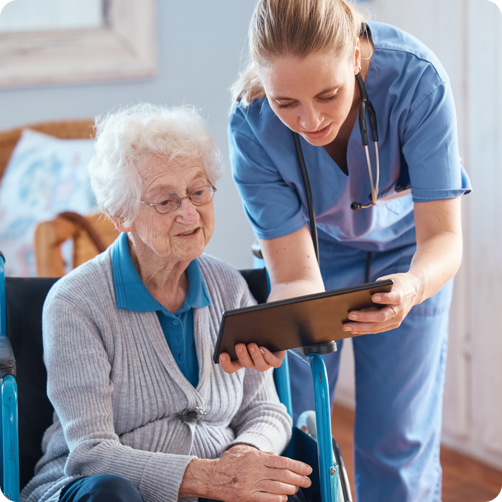 A clinician assists an elderly patient