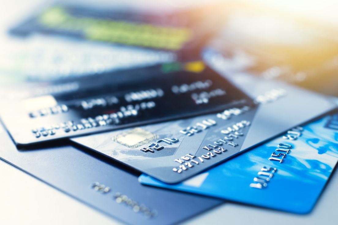 Credit cards spread out on a desk