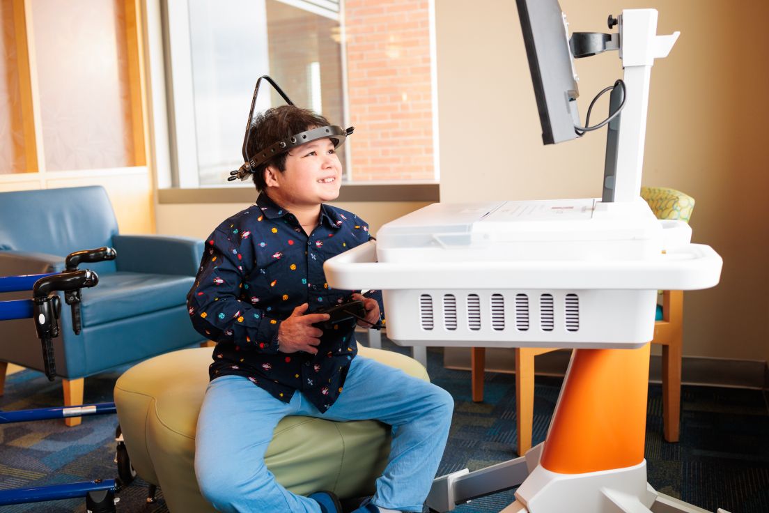 Patient enjoying GO Karts game during treatment