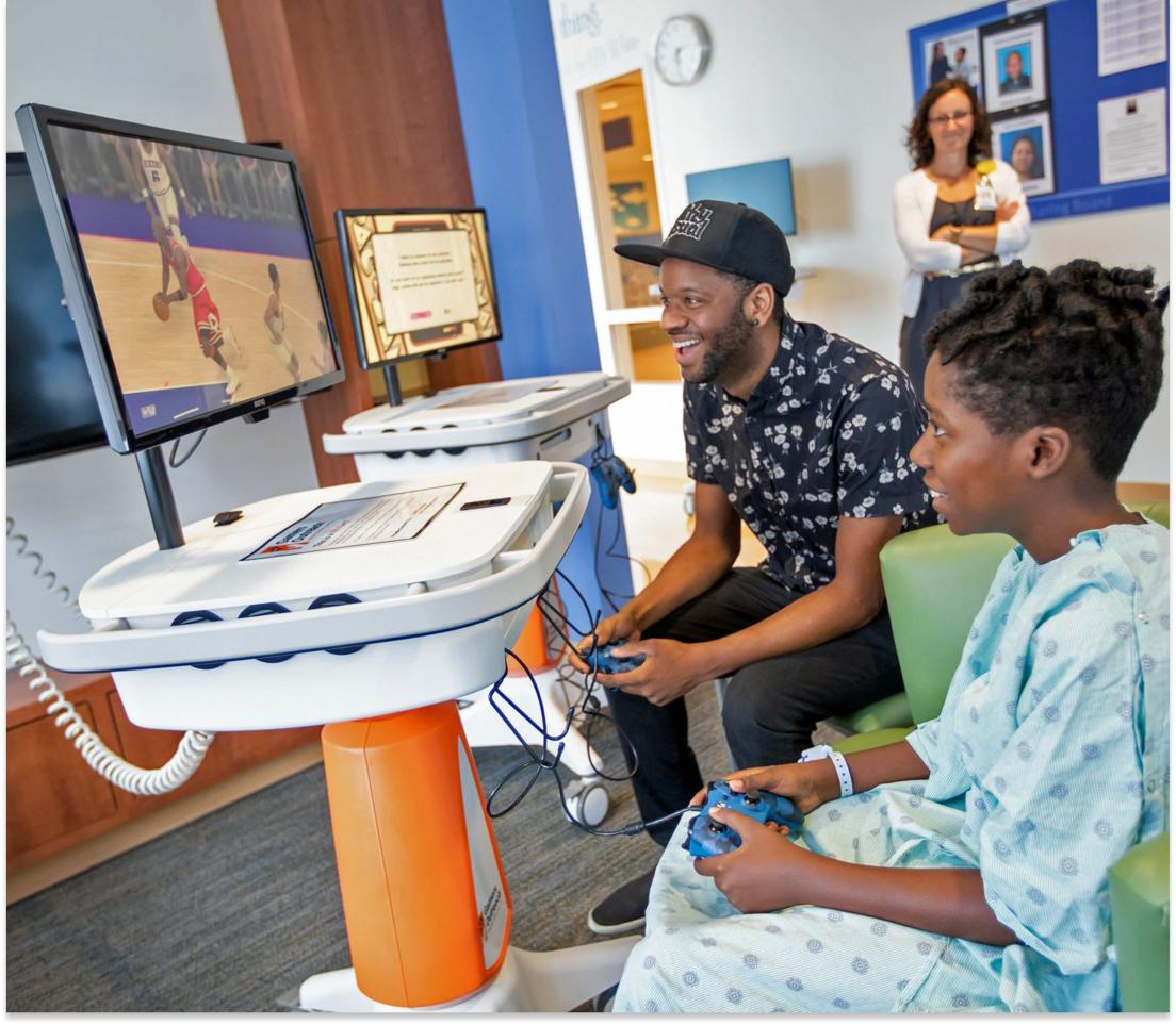 GO Karts child playing a game at the hospital