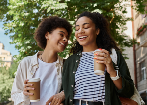 A clinician and friend enjoy a walk and coffee