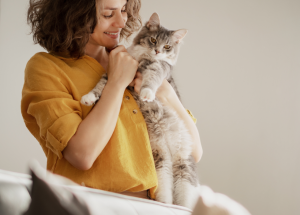 A clinician and their cat